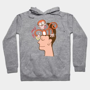 Let's meditate. Mad monkey knocking on the forehead of a man in meditation Hoodie